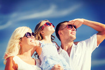 Image showing happy family with blue sky