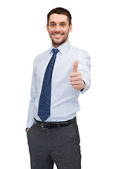 Image showing handsome buisnessman showing thumbs up