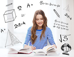 Image showing happy smiling student girl with books