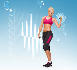 Image showing young sporty woman with light dumbbells