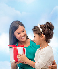 Image showing happy mother and child girl with gift box