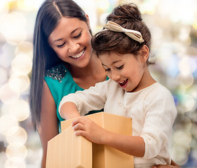 Image showing happy mother and child girl with gift box