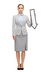 Image showing serious businesswoman with direction arrow sign