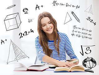 Image showing happy smiling student girl with books