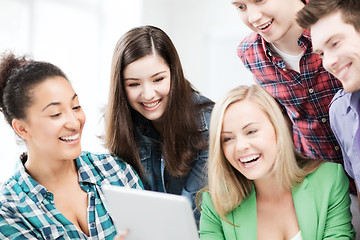 Image showing students looking at tablet pc in lecture at school