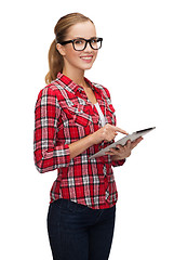 Image showing smiling girl in eyeglasses with tablet pc computer