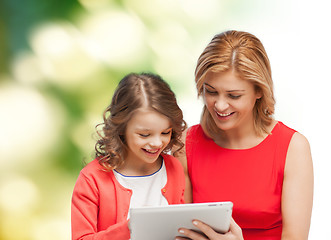 Image showing mother and daughter with tablet pc computer