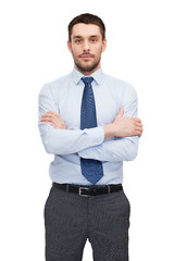 Image showing handsome buisnessman with crossed arms