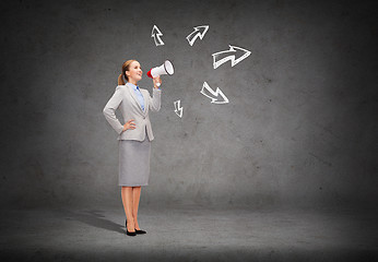 Image showing smiling businesswoman with megaphone