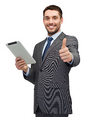 Image showing smiling buisnessman with tablet pc computer