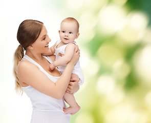 Image showing happy mother with adorable baby