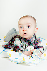 Image showing Eyed astonished baby