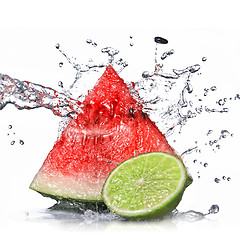 Image showing watermelon, lime and water splash isolated on white