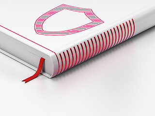 Image showing Safety concept: closed book, Contoured Shield on white background