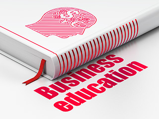 Image showing Education concept: book Head With Finance Symbol, Business Education on white background