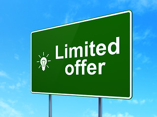 Image showing Business concept: Limited Offer and Light Bulb on road sign background