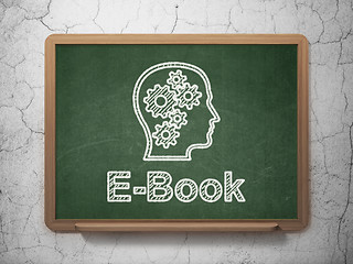 Image showing Education concept: Head With Gears and E-Book on chalkboard background