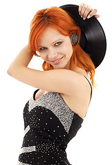 Image showing happy redhead with vinyl record