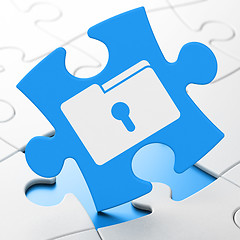 Image showing Finance concept: Folder With Keyhole on puzzle background