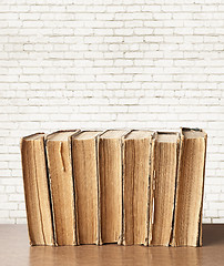 Image showing stack of books on the table