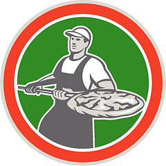 Image showing Baker Holding Peel With Pizza Circle Retro