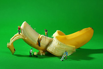 Image showing Construction Workers in Conceptual Food Imagery With Banana