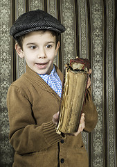 Image showing Child with red vintage book