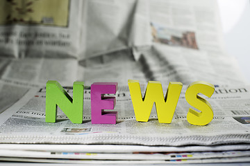 Image showing Word news on newspaper