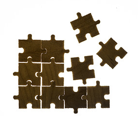 Image showing Wooden puzzle and backlight background