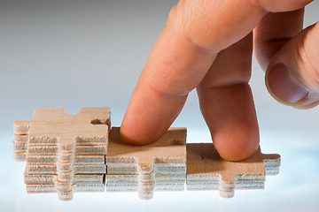 Image showing Steps made ??of wooden puzzle partes