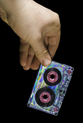 Image showing Hand holding vintage cassette tape