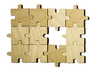 Image showing Wooden puzzle on white background. 