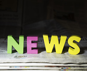 Image showing Word news on newspaper