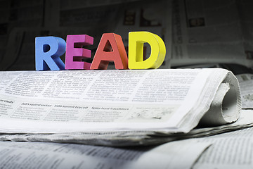 Image showing Word read on newspaper