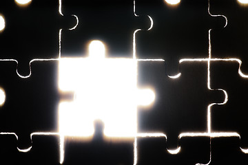 Image showing Wooden puzzle and backlight background