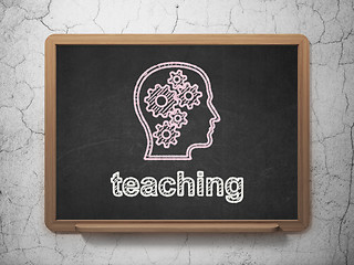 Image showing Education concept: Head With Gears and Teaching on chalkboard background