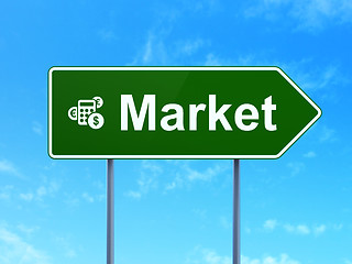 Image showing Finance concept: Market and Calculator on road sign background