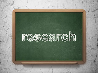 Image showing Advertising concept: Research on chalkboard background