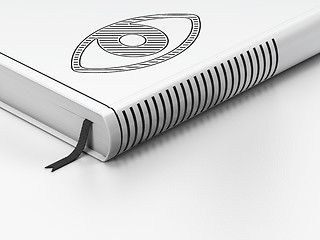 Image showing Security concept: closed book, Eye on white background