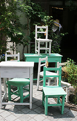 Image showing Pile of tables and chairs