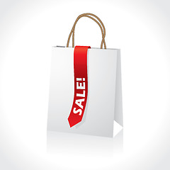 Image showing Shopping white paperbag with red ribbon