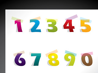 Image showing Color paper numbers sticked to background with tape