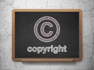 Image showing Law concept: Copyright and Copyright on chalkboard background