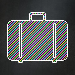 Image showing Vacation concept: Bag on chalkboard background