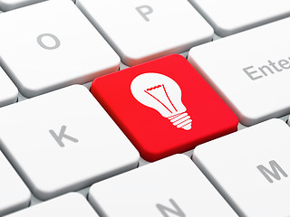 Image showing Finance concept: Light Bulb on computer keyboard background