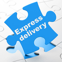 Image showing Business concept: Express Delivery on puzzle background