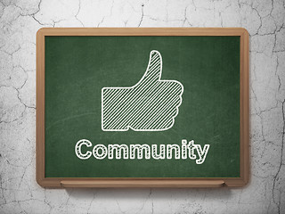 Image showing Social media concept: Thumb Up and Community on chalkboard background