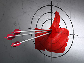 Image showing Social network concept: arrows in Thumb Up target on wall background