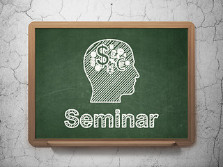 Image showing Education concept: Head With Finance Symbol and Seminar on chalkboard background