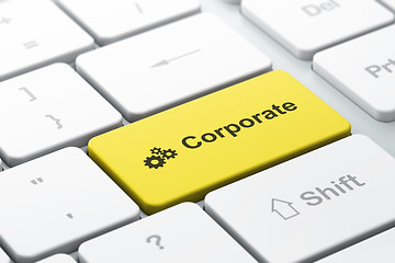 Image showing Finance concept: Gears and Corporate on computer keyboard background